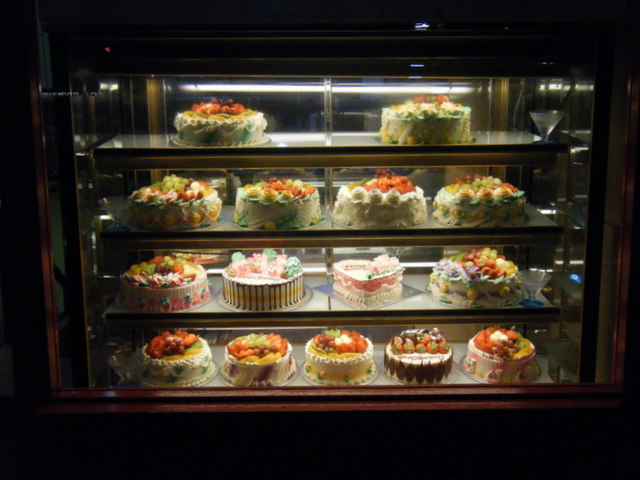 Niche cakes in display case